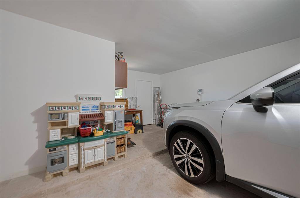 Wanted to show you the additional storage space in the garage...and there's a pedestrian door to the backyard