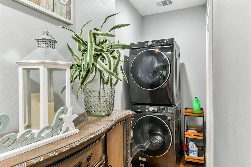 Indoor stackable washer and dryer.