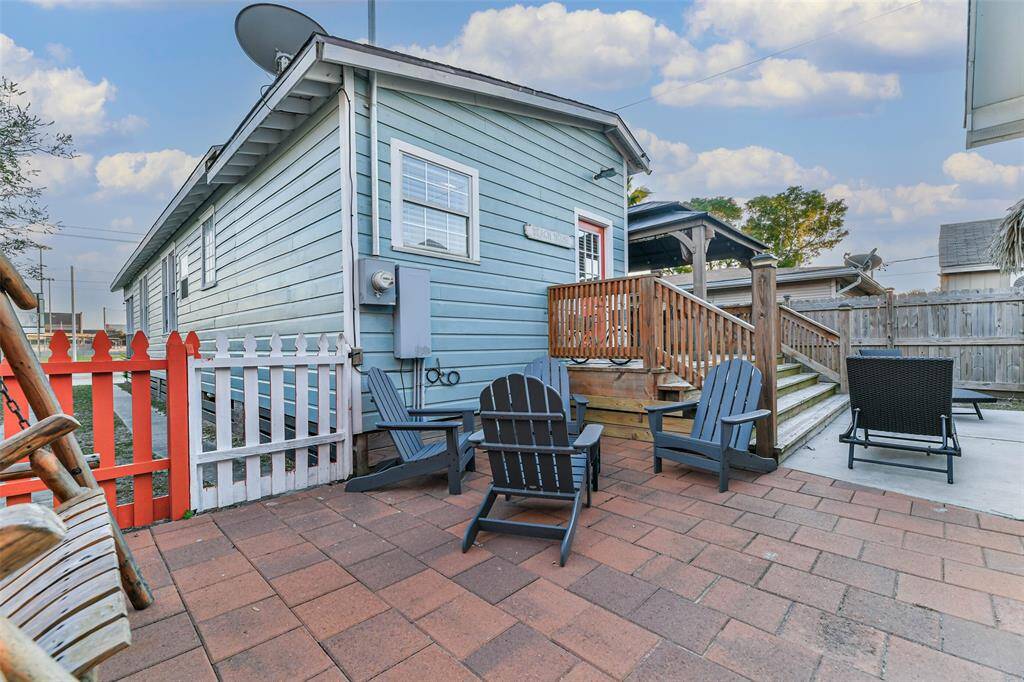 Ground-level pavers elegantly extend the patio.