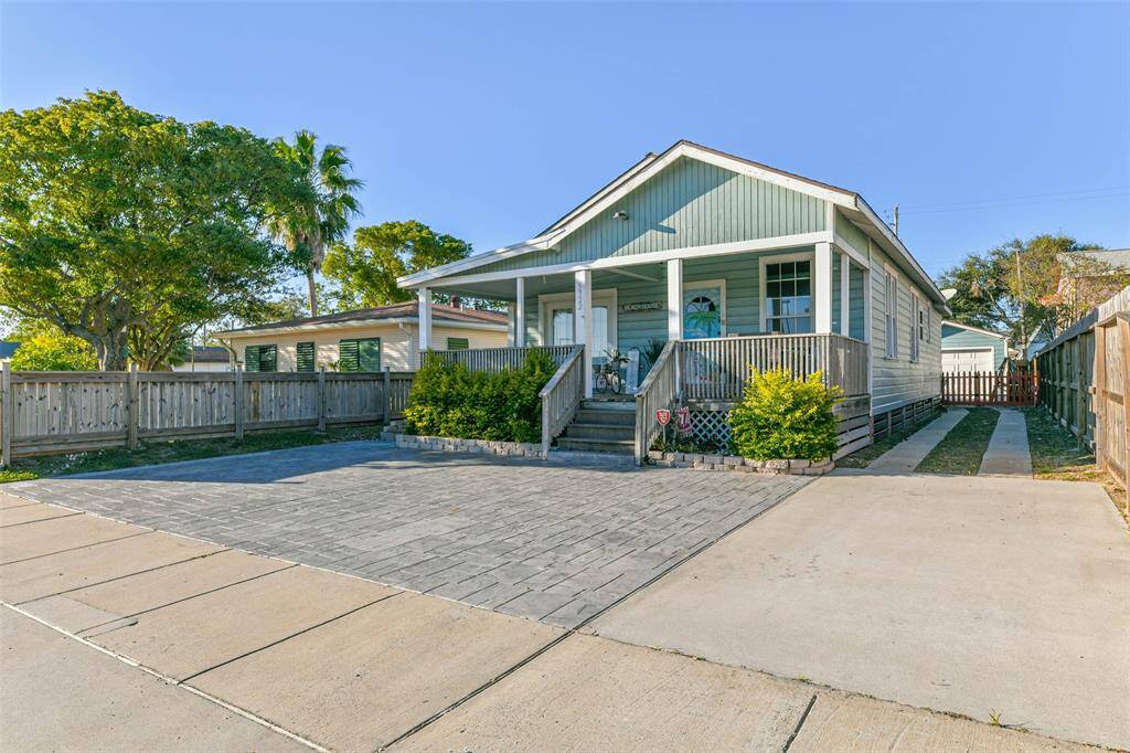 A driveway that leads to the garage.