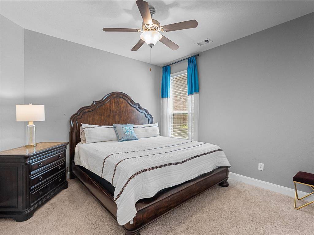 Second primary bedroom located on first floor.