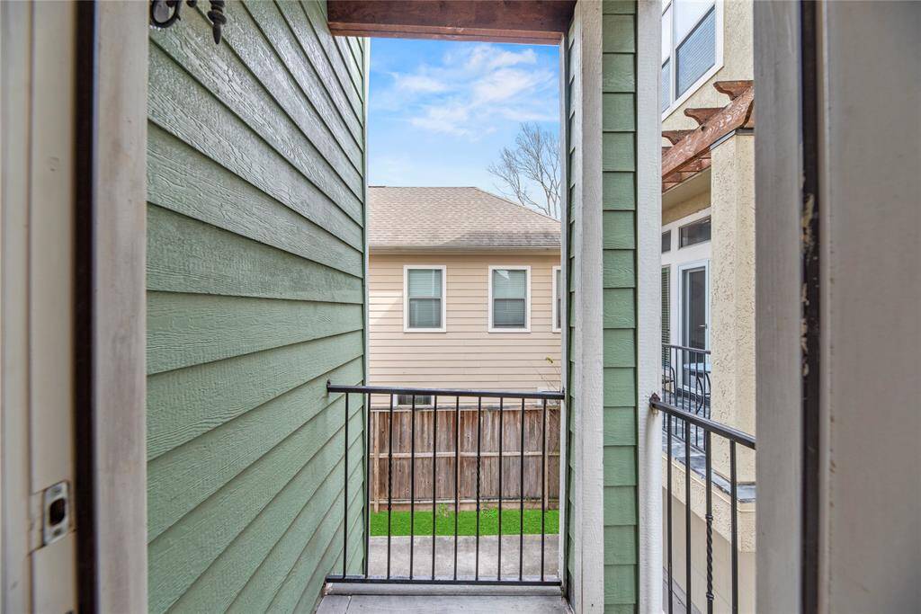 Just off the dining area, a charming balcony awaits—perfect for entertaining guests, or savoring your morning coffee in the fresh air.