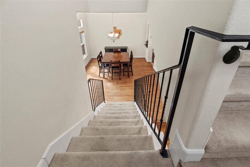 Now let's head up the second staircase to the primary suite.....