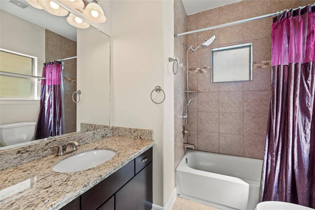 The third full bath with large vanity, practical comfort meets beautiful design.