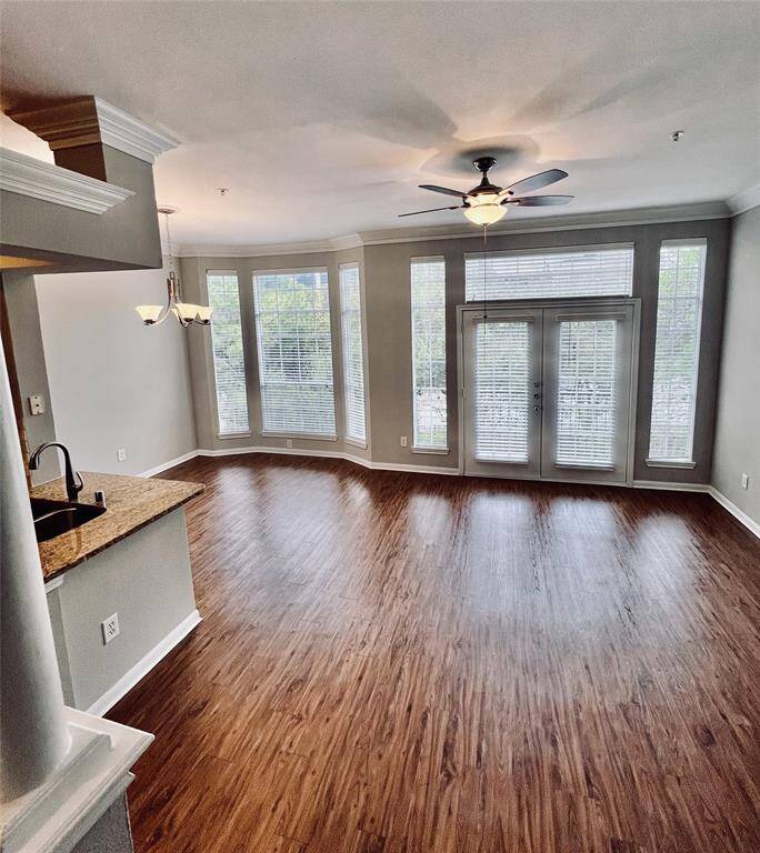 This spacious townhouse is located on the 3rd floor with Juliet style balcony.