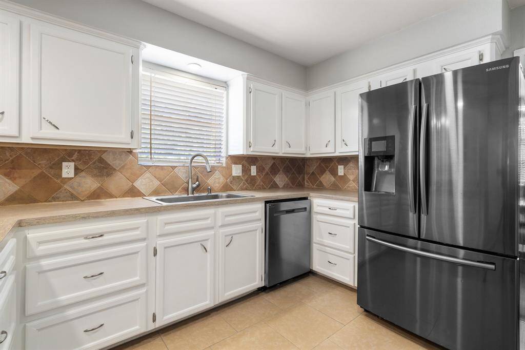 Bright kitchen with a window over sink.