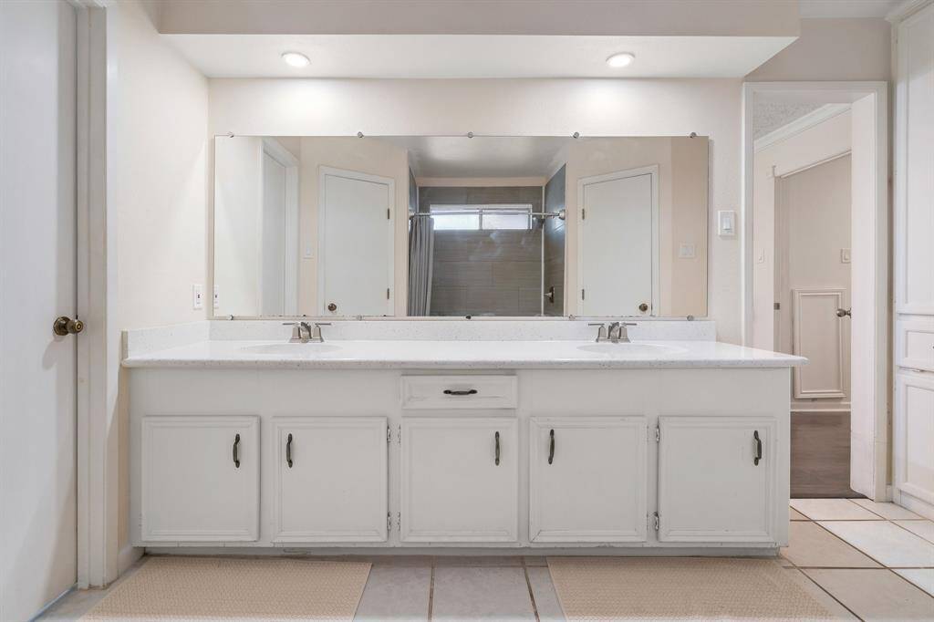 Double sinks in primary bathroom.