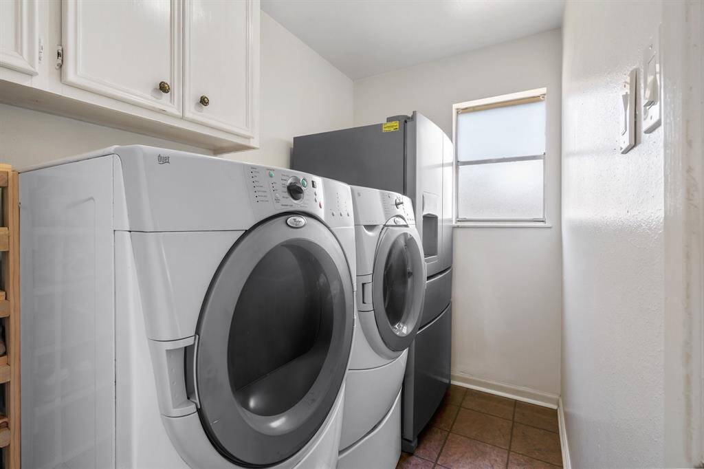 Large laundry room with space for a 2nd fridge or freezer.