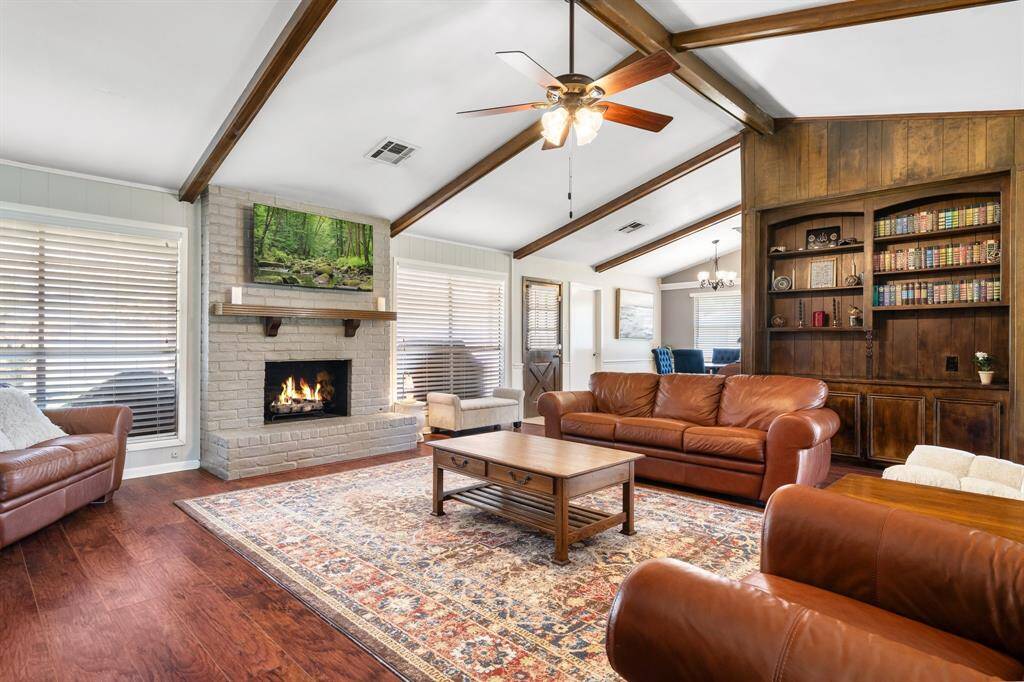 Extraordinary family room with vaulted ceiling and fireplace.