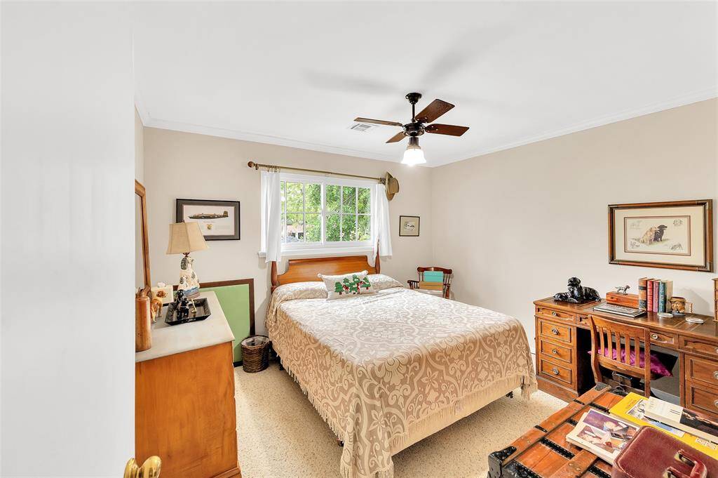 Pleasant secondary upstairs bedroom.  All upstairs bedrooms and hall have crown molding.