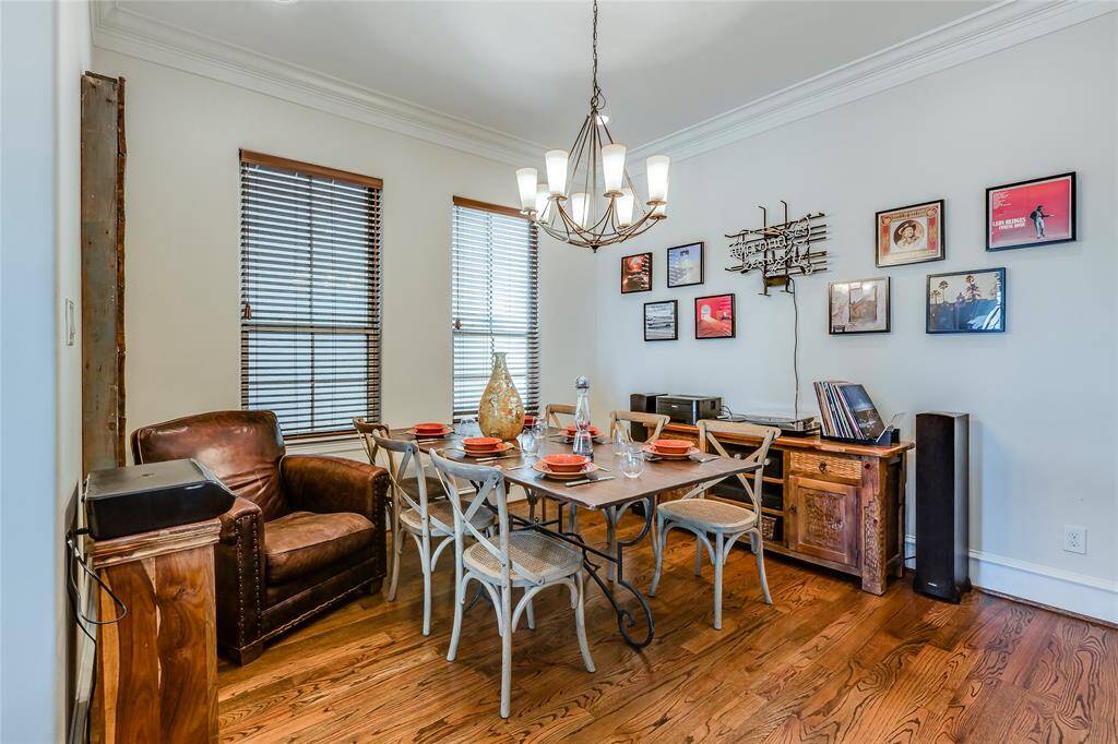 Dining Room with chandelier & hardwood floors