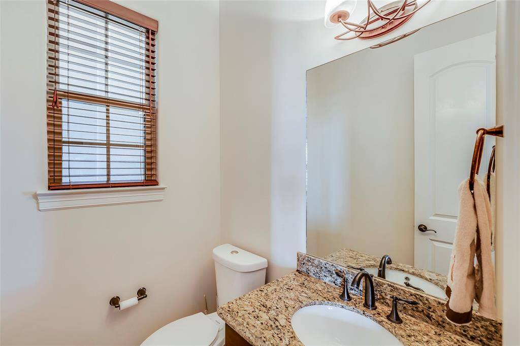 Half bath with granite counters, oil rubbed bronze faucets