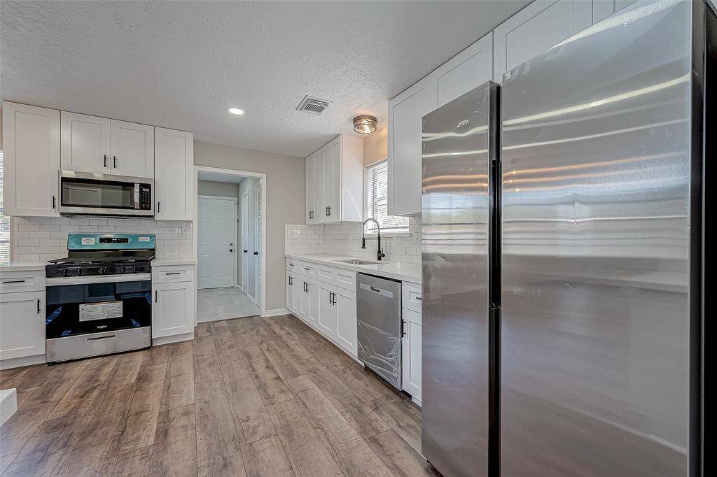 New appliances to with beautiful counter tops.