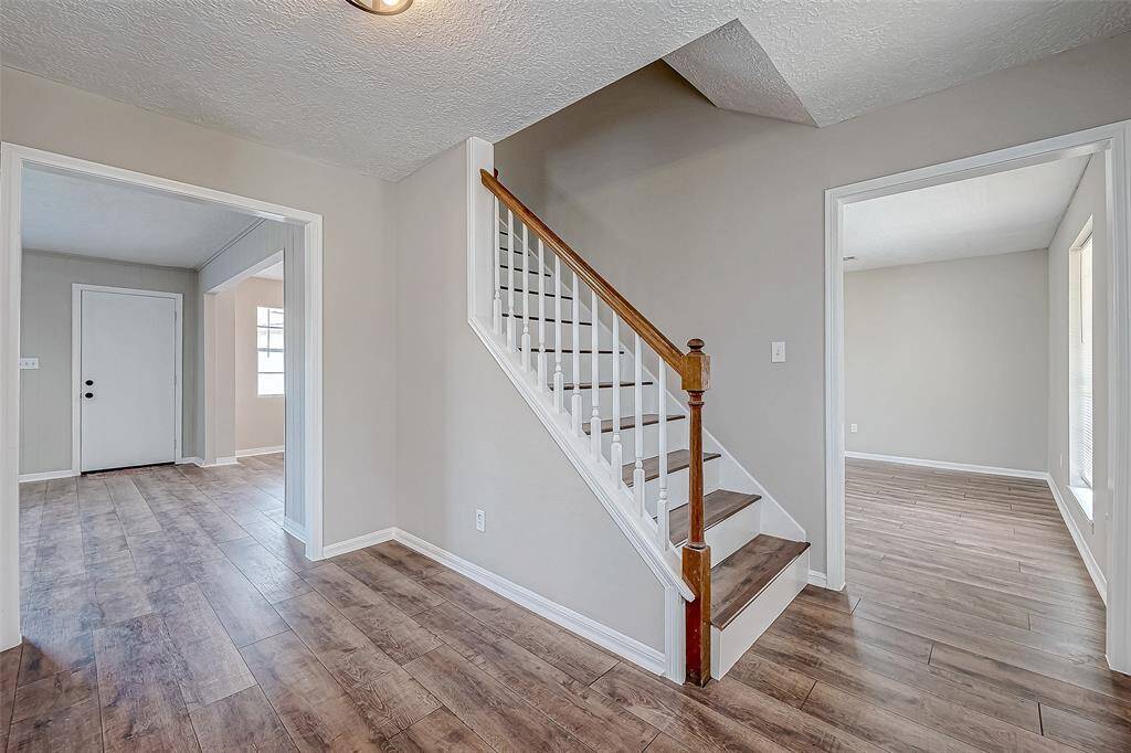 Luxury vinyl plank flooring throughout the house.