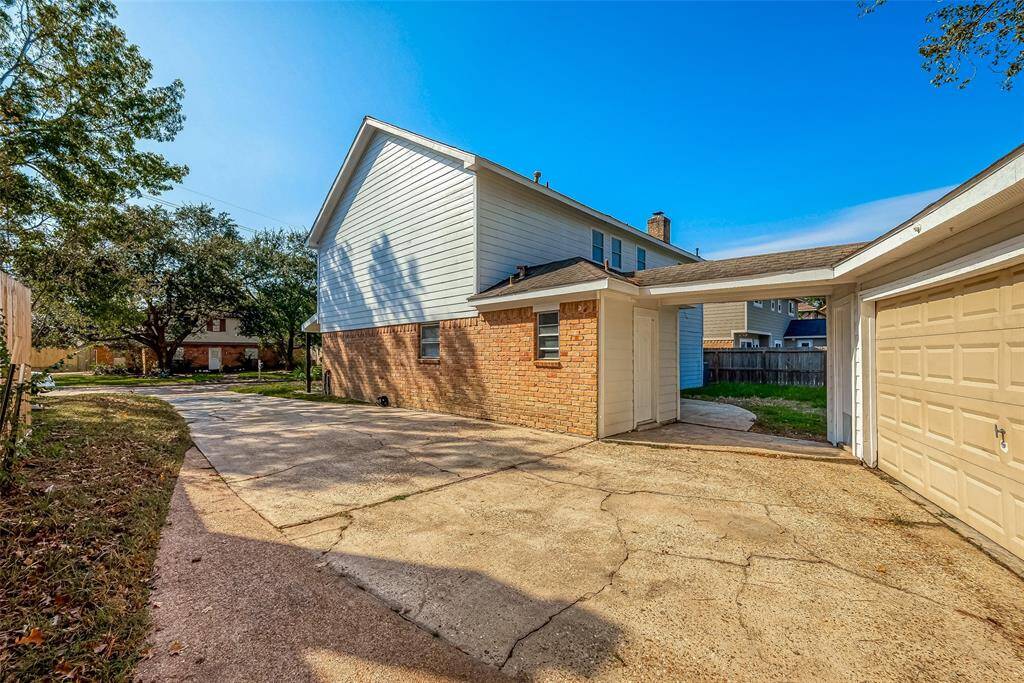Two car garage with double wide drive way good enough to park 8 to 10 caars.