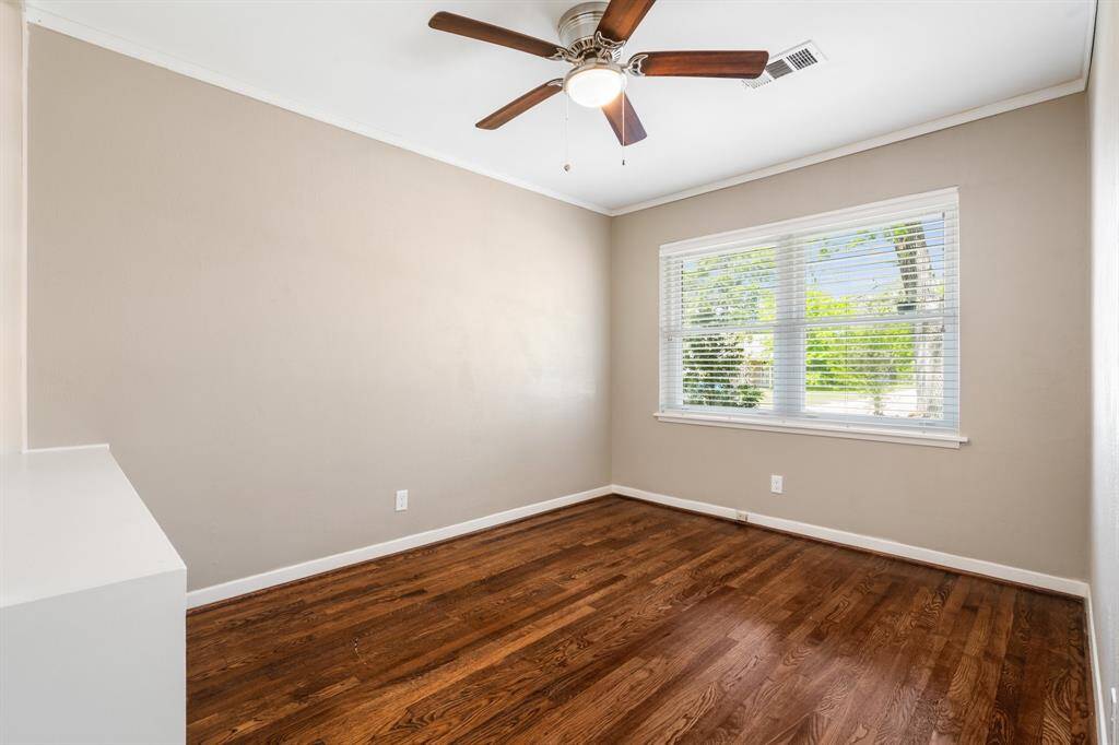 All secondary bedrooms also have beautiful hardwood flooring, and crown molding.
