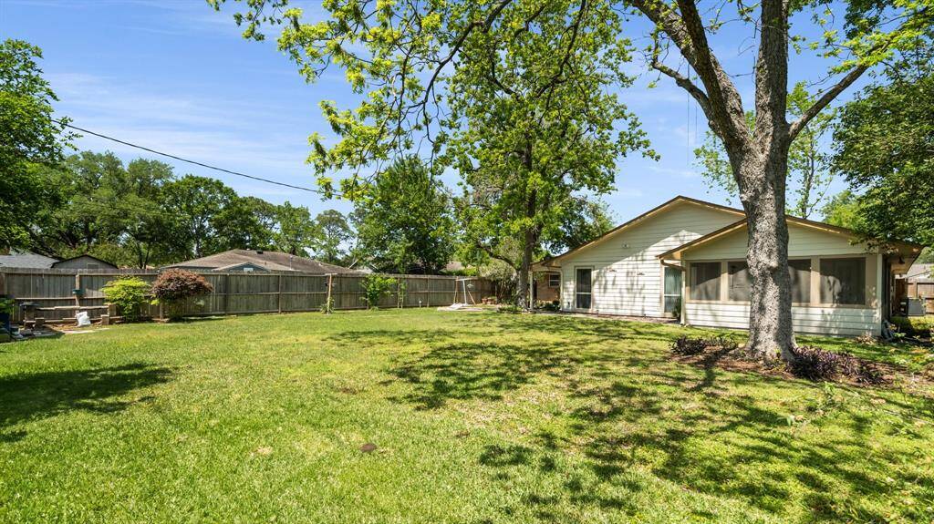 Huge backyard with plenty of space for your swimming pool! This is the back view of the house.