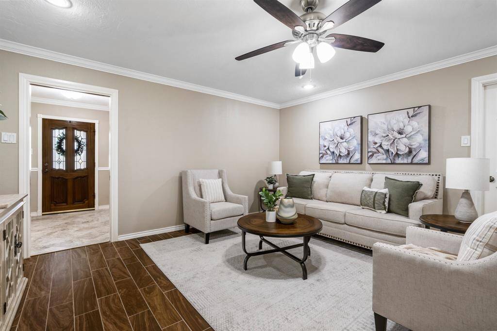The entryway offers a bit of privacy when welcoming guests.  The family room is the heart of the home.