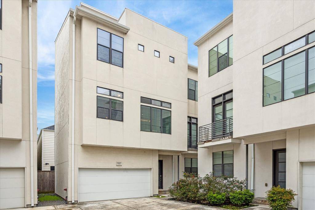 Move right into this contemporary Cottage Grove three-bedroom, three-and-a-half-bathroom freestanding residence featuring a home office, rooftop deck, generous storage and abundant natural light.