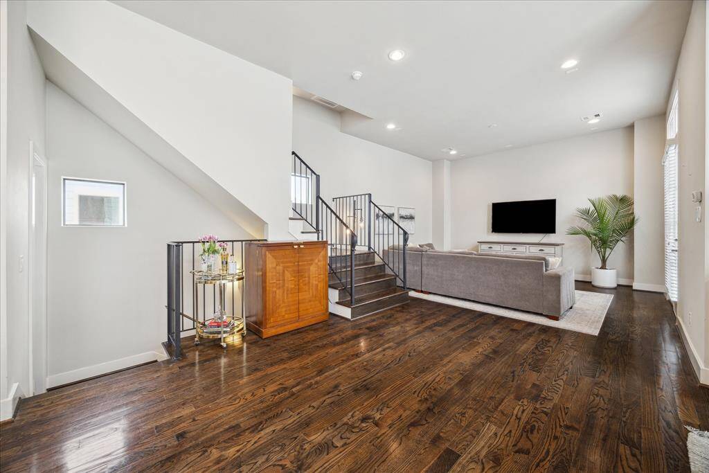 On the second floor, you’ll find your expansive, open-plan living and entertaining space flanked by sunny south-facing windows and a private balcony.