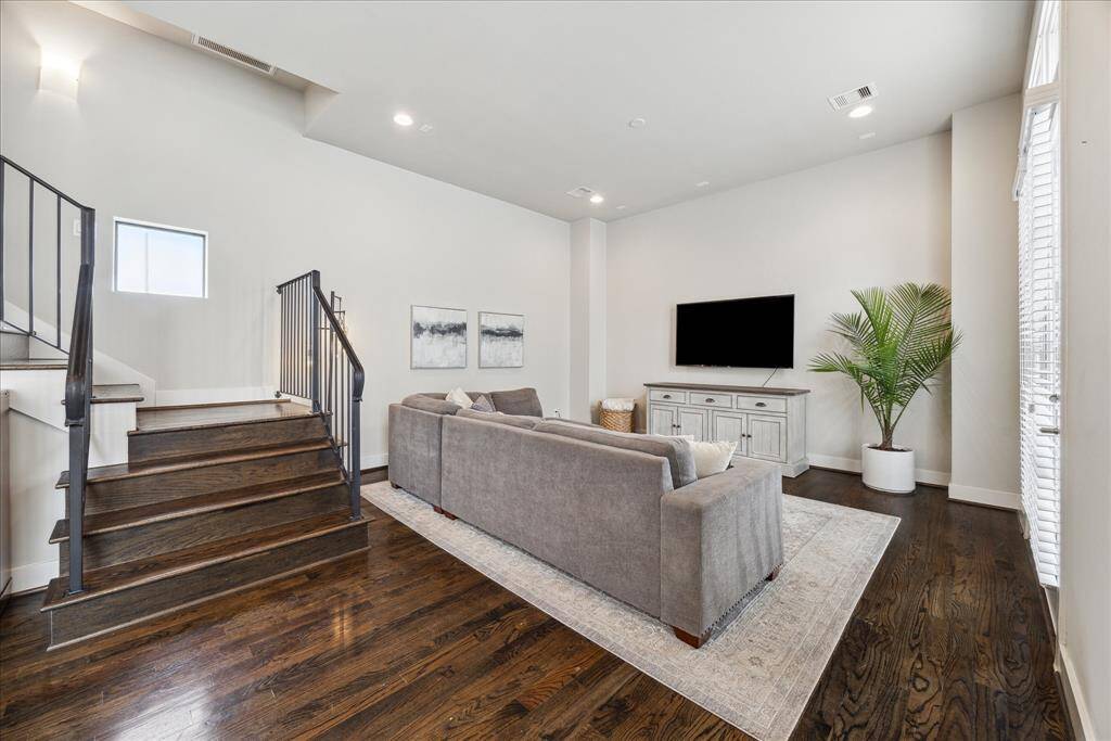 Relax and unwind in the large living room conveniently equipped with A/V connections, speaker pre-wiring, and an additional outlet for a ceiling fan or light fixtures.