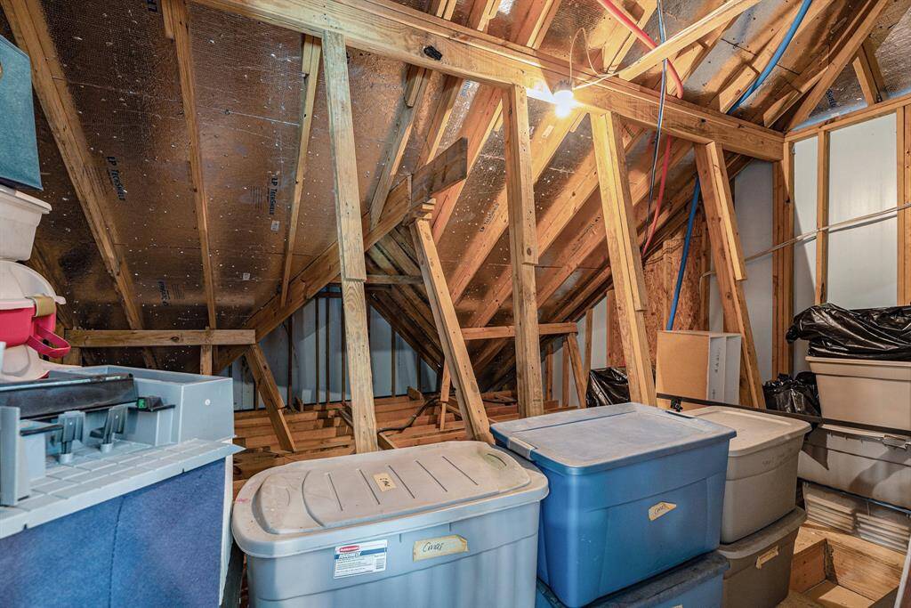 HUGE walk in access storage that spans over the entire area above the garage(accessible through door at top of stairway