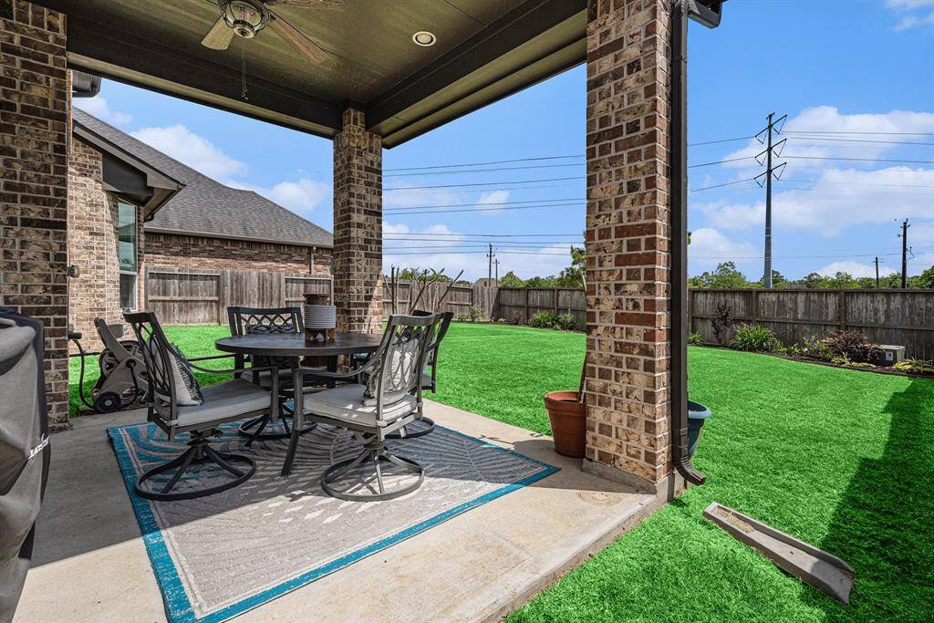 Back porch has natural gas line connection for gas grill hookup or fire pit