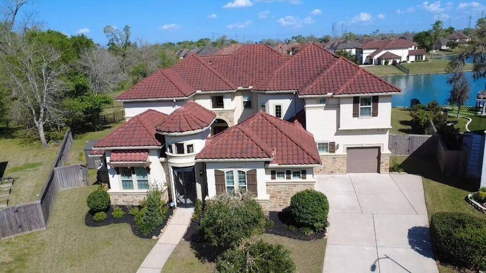 Majestic elevation for this Stone and Stucco Home with Tile Roof - More pics coming soon