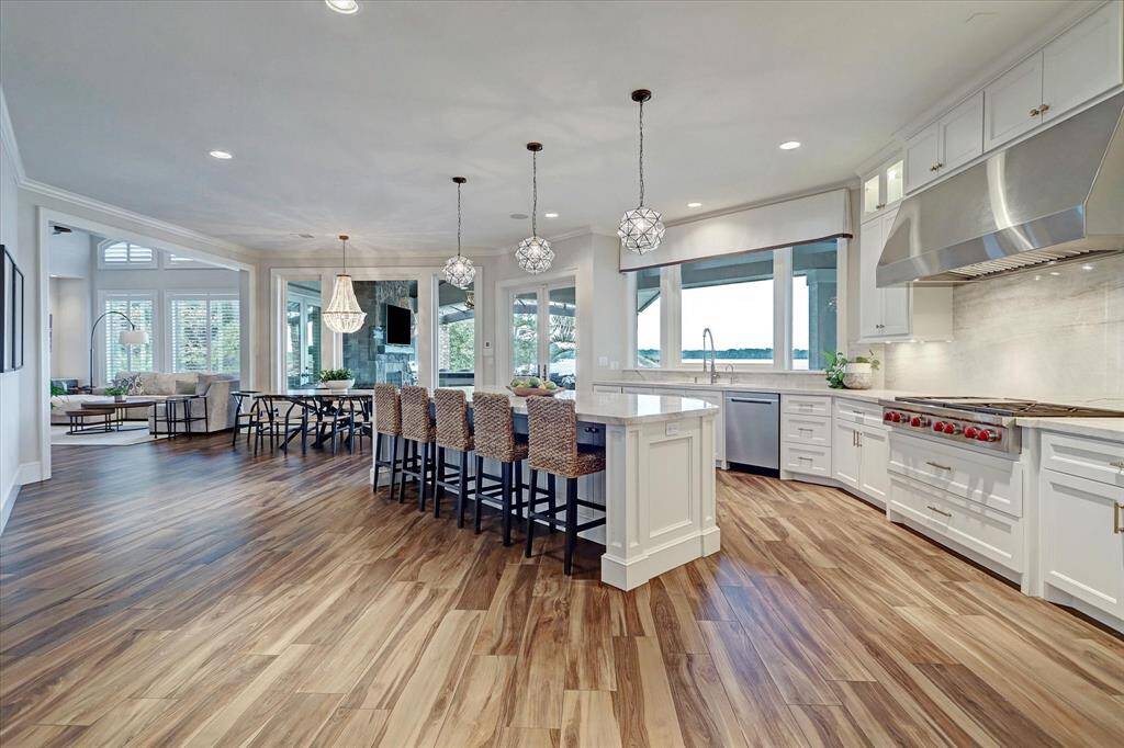 The kitchen has open views to breakfast and family room.