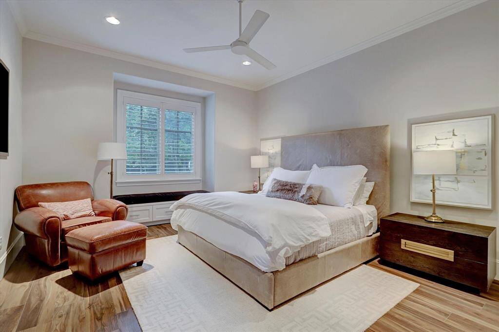 Guest suite downstairs offers comfort and privacy, ideal for visitors or multi-generational living.