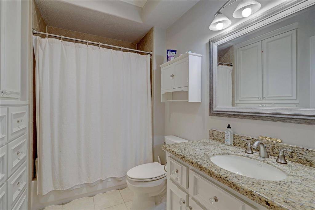 Full bathroom for downstairs guest bedroom.
