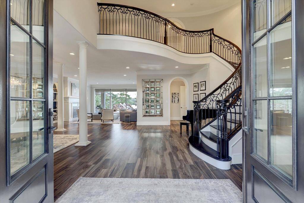 Stately double doors set the tone for elegant living.