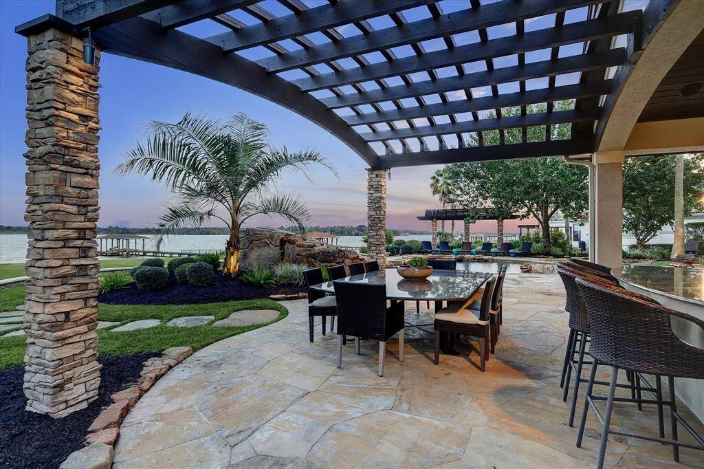 Outdoor dining al fresco with beautiful lake views.