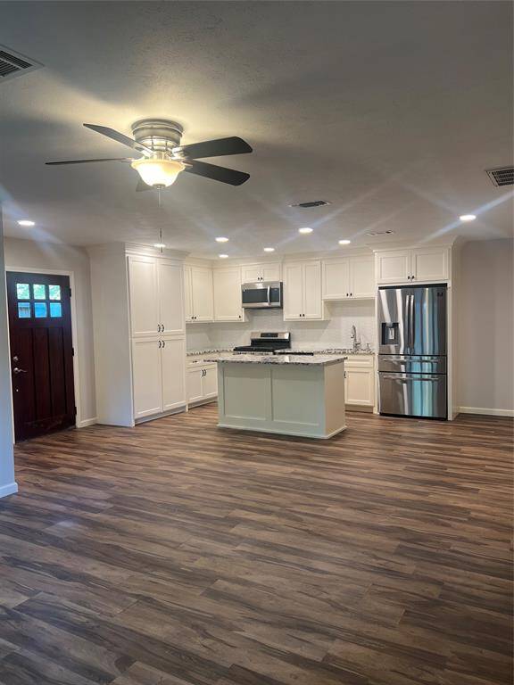 The kitchen is opn to the living room.