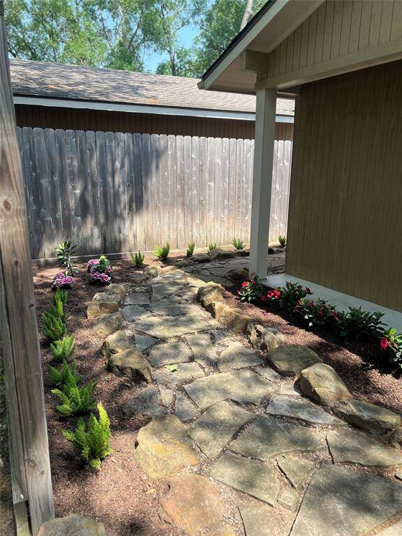 This private interior front yard has fresh landscaping.