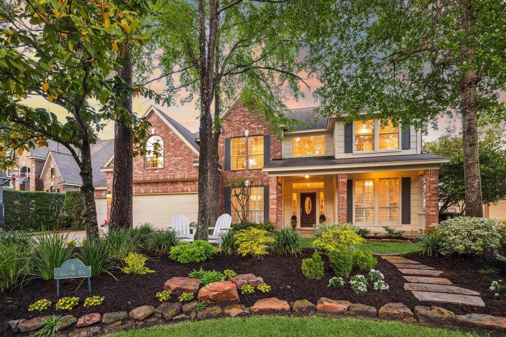 This charming home, nestled in a sun-dappled enclave corner of Panther Creek in The Woodlands, whispers through its open windows and warm wooden floors, inviting you to step inside, to belong, to be home.