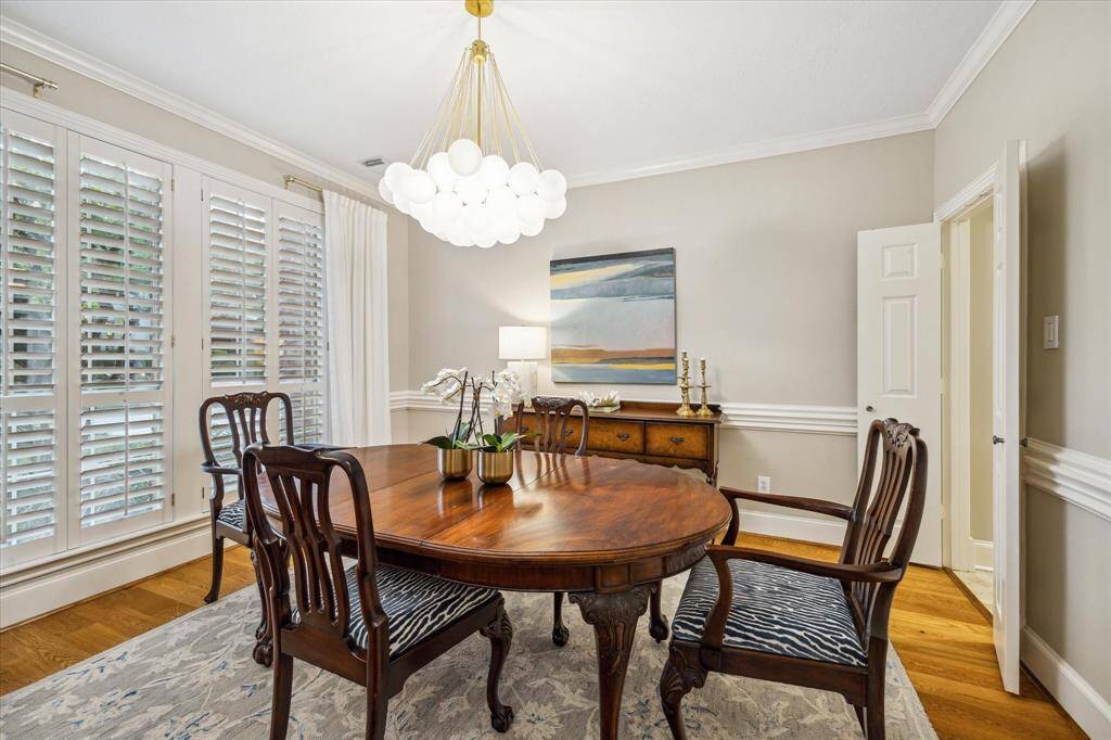 The formal dining room with plantation shutters offers an intimate entertaining space for holidays and other celebrations.