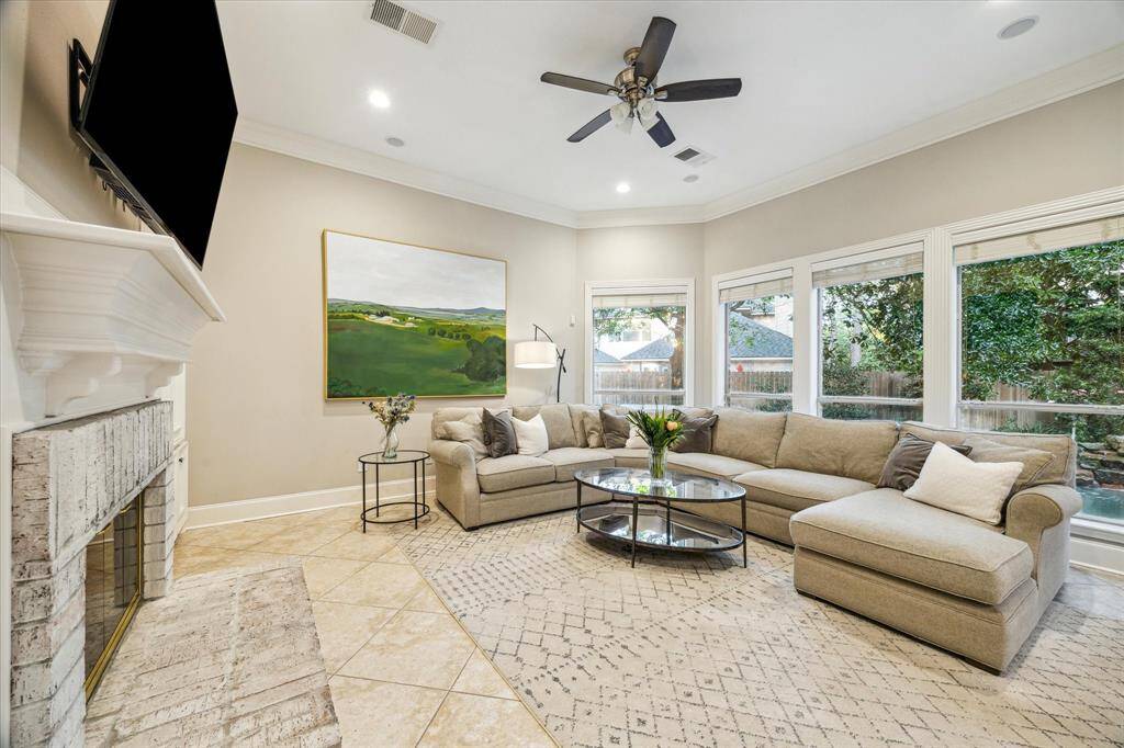 Enjoy a relaxing afternoon and feel connected to the outdoor space from the comfy living room couch.