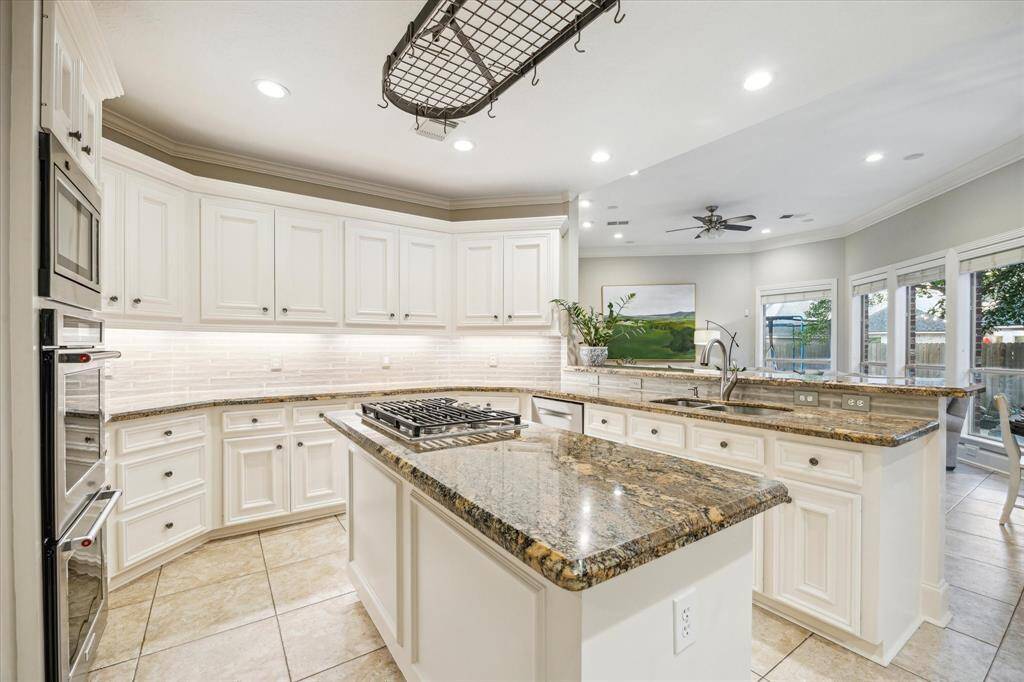 Generous countertop space invites time spent in the kitchen preparing favorite meals with friends and family.