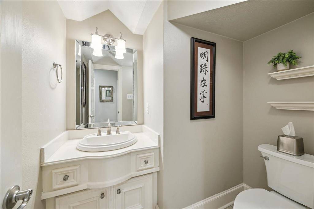 Bathrooms are also well-appointed with top-shelf finishes from the molding to the lighting.