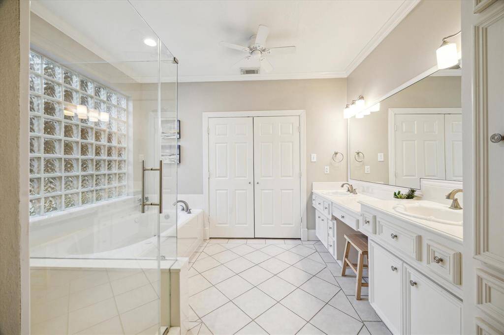 Melt away the day’s worries in the primary en suite bathroom with large soaking tub, double vanities and separate shower.