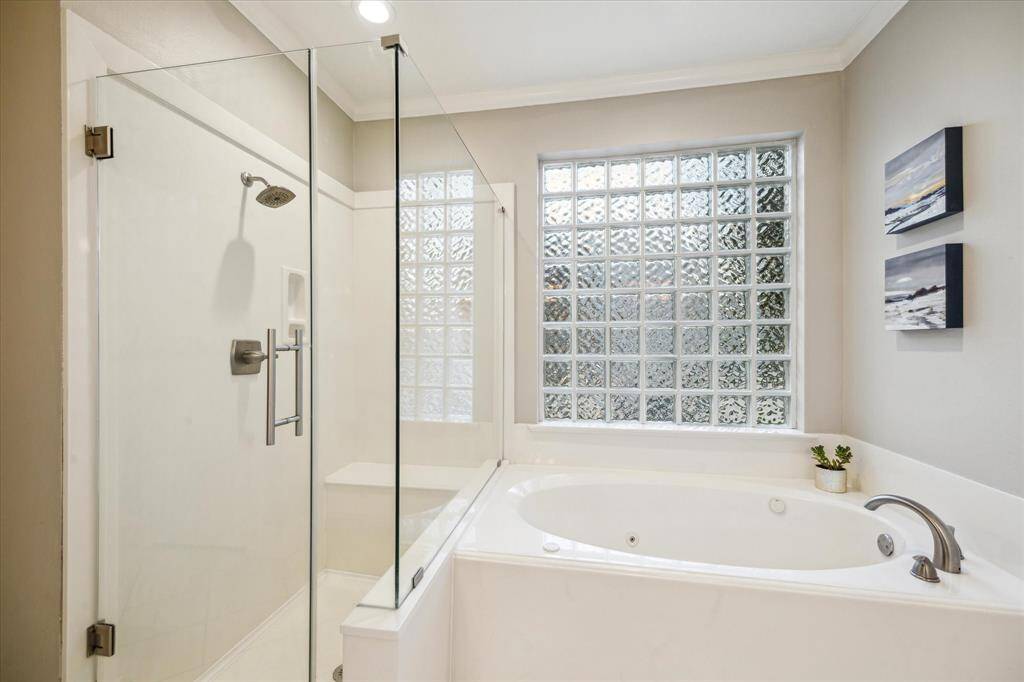 Enjoy your own spa at home in the primate en suite bathroom retreat.