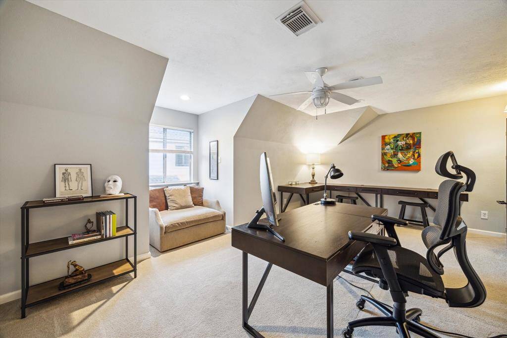 With plenty of bedrooms, this room lends itself to an ideal work-from-home office space.