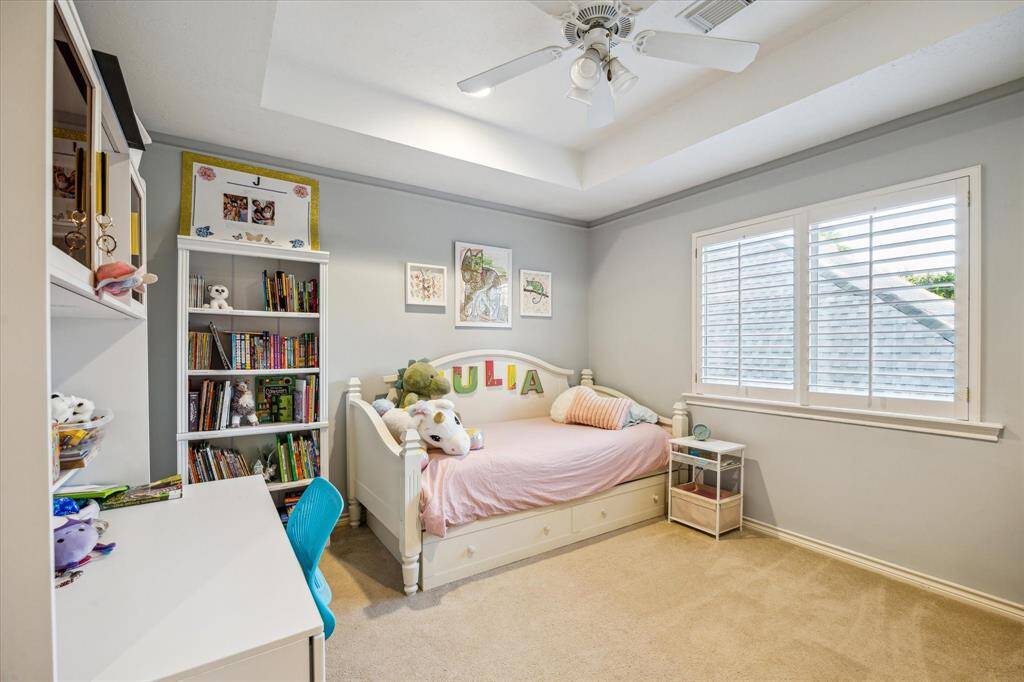 Coffered ceilings in the bedroom create an even greater feeling of height and space.
