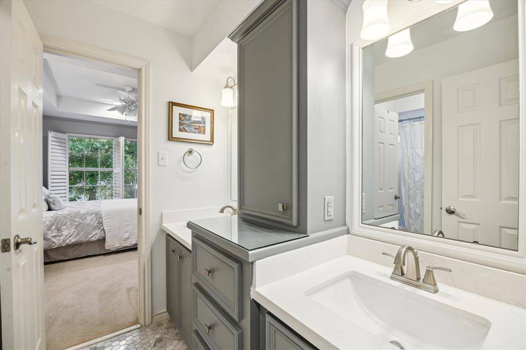 Secondary bathrooms also feature custom lighting, cabinetry and high-end finishes.