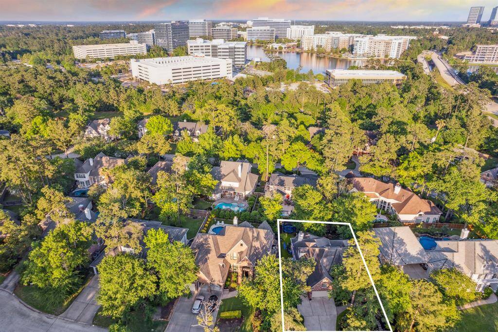 Nestled among mature trees in a private oasis with its own swimming pool.