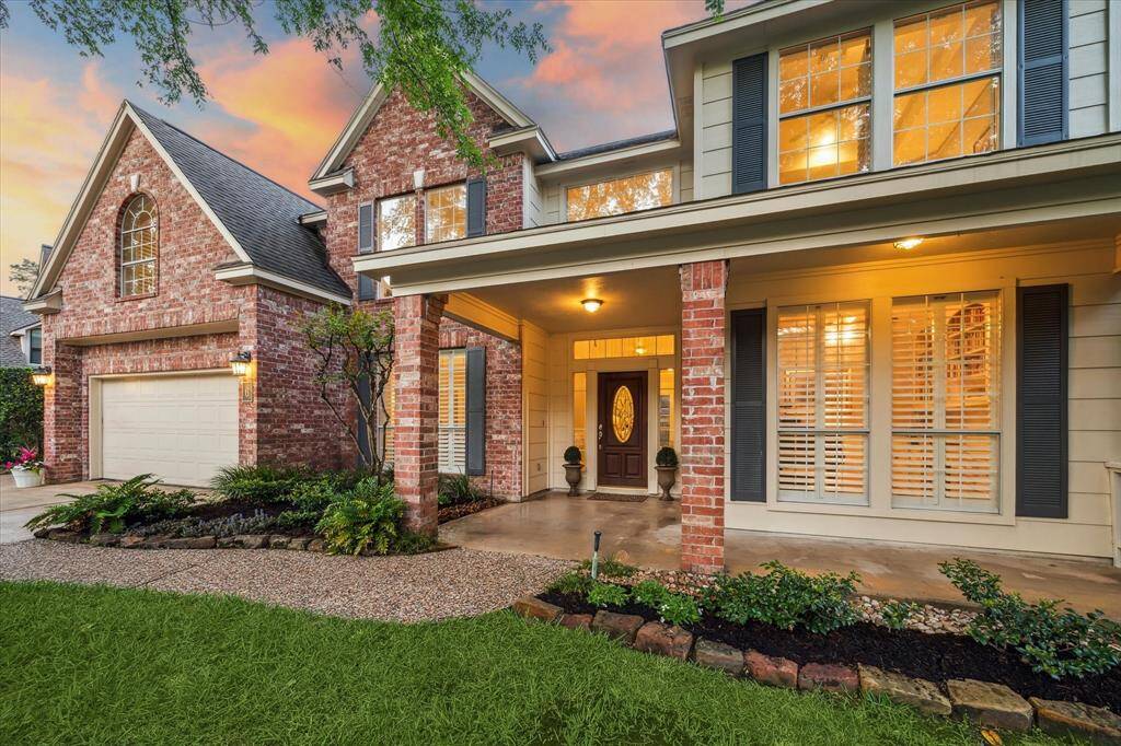 Stately brick 2-story home in the coveted Panther Creek neighborhood in The Woodlands.