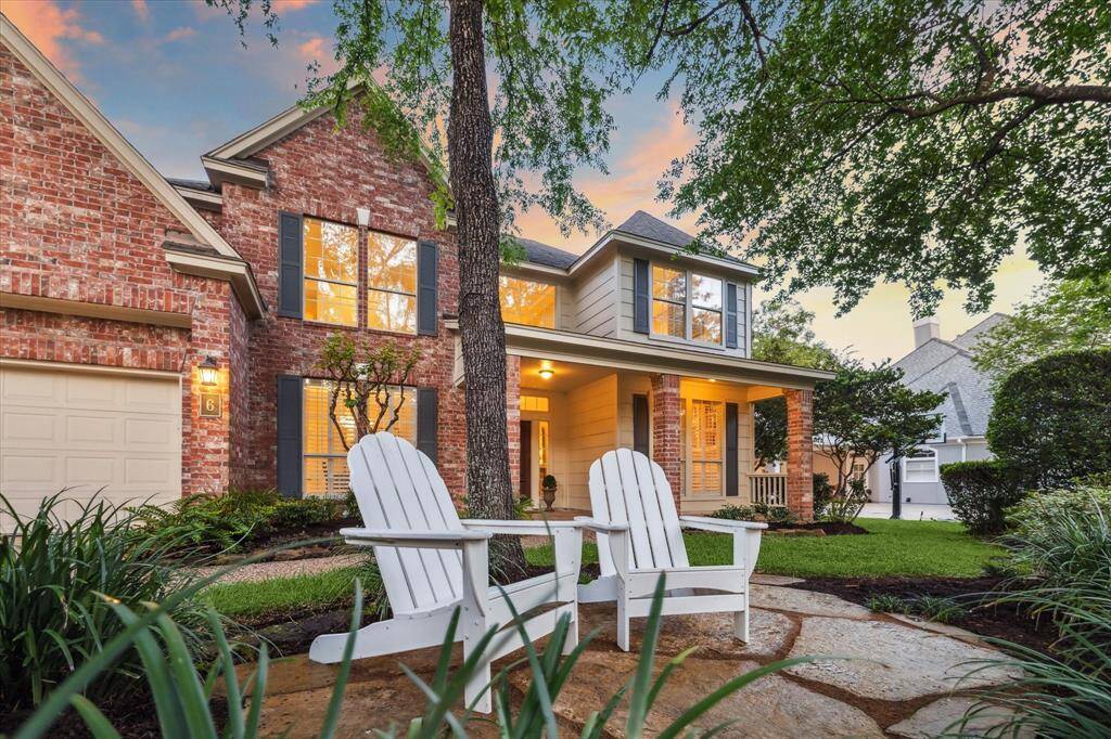 Even the front yard is a welcoming place to relax and take in the neighborhood or greet passersby.