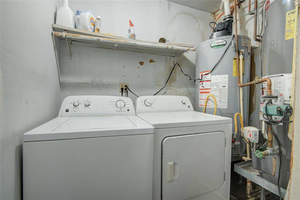 Laundry room is across from the unit