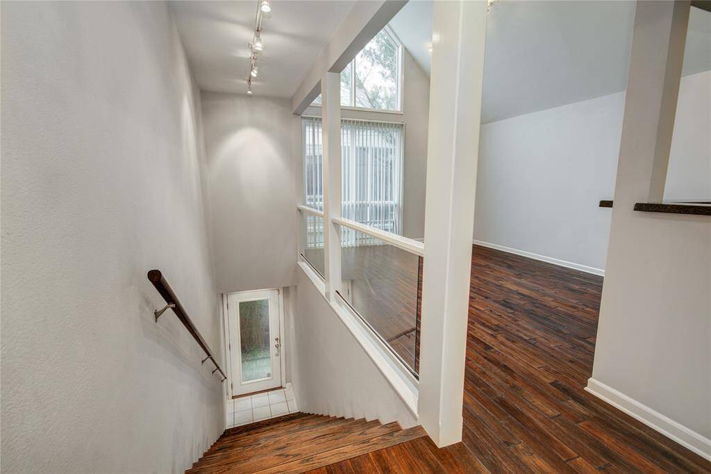 Custom glass railing adds to the modern architecture